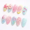 3D flamingo summer press on nails in pink blue and yellow with starfish hibiscus citrus slice heart charm and floral engravings