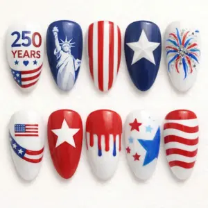 Bold patriotic 250 years Statue of Liberty press on nails with rhinestone fireworks stars stripes drip art and American flag designs for 4th of July