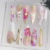 3D Butterfly Floral Press On Nails | Pink Purple Fake Nails | EV20 6 3D butterfly floral stiletto press on nails in pink and purple with aurora shimmer and gold charm, displayed in clear nail box