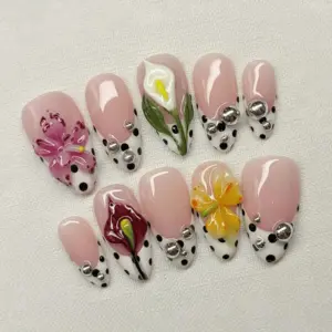 3D calla lily press on nails with polka dot French tips, silver ball studs, white and burgundy calla lilies, fuchsia orchid and yellow butterfly flower on pink for spring