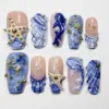 3D dolphin ocean press on nails with blue marble texture, shell design, starfish and gold bead accents