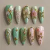 3D dragonfly press on nails with jade green marble base, gold arch flower, pink camellia, teal glass flower, gold linework and blush rose cluster for spring