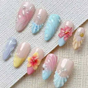 3D floral shell press on nails in pastel pink blue lilac and yellow with hibiscus blooms and pearl accents