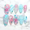 3D Floral Shell Press On Nails - Pink Blue Ocean Fake Nails | ST16 3 3D floral shell press on nails in pink and blue pearl shimmer with iridescent sequins and crystal rhinestones