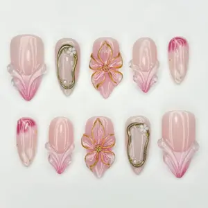 3D floral wedding press on nails in blush pink with gold accents and pearl details