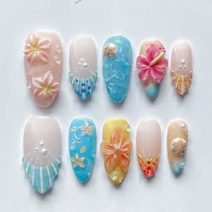 3D hibiscus tropical press on nails with beach florals, ocean wave, shell texture and pearl accents in pink blue and yellow