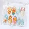 3D Hibiscus Conch Press On Nails - Beach Shell Fake Nails | ST26 8 3D hibiscus conch shell press on nails in rose gold aqua blue peach and amber with starfish ocean swirls and gold bead accents displayed in clear acrylic box