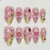 3D pink flower press on nails with polka dots, honeybees, ladybugs and green leaves on dusty pink and cream base for spring