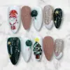 3D Santa Christmas Tree Press On Nails | Green Gold Fake Nails | SE86 11 Christmas press on nails with hand-painted Santa Claus, 3D cable knit texture in mocha, Christmas tree with star, dark green woodgrain nails with gold charms and champagne glitter
