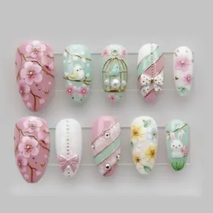 3D floral bird cage press on nails with cherry blossoms, bow charm, bunny and pastel pink mint design for spring