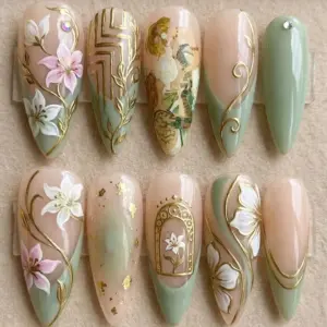 Art Nouveau press on nails with hand-painted lilies, gold vine linework, Mucha-style portrait, gilded arch frame and sage green nude palette for spring