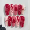 Cherry Flame Heart Press On Nails | Y2K Valentine Fake Nails | EV55 4 Y2K red and pink press on nails with cherry, flame, heart, flower and grunge art designs for Valentine's Day