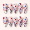Cute blush patriotic press on nails with red blue stars black polka dots swirl stripes and silver rhinestone accents for 4th of July