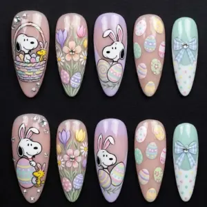 Easter press on nails with cartoon dog in bunny ears and bird friend, floral garden, pastel Easter eggs scatter and gingham bow on rose beige lilac and mint green bases