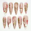 Gold Foil Floral Press On Nails | Pink Lotus Fake Nails | EV17 5 Long stiletto press on nails with gold foil lotus design on blush pink base and white french tips