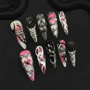 Gothic pink and black press on nails with 3D silver cross charms spider web art and pearl accents