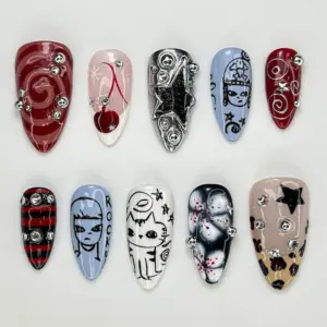 Grunge Y2K press on nails set with gothic doodles, cherry, silver star, plaid, leopard print, and rhinestone details