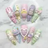 Kawaii Easter press on nails with 3D bunnies, hatching chick, woven egg basket, heart shaker, bow and gingham in pastel pink lilac green blue and yellow Title: Kawaii Easter 3D Press On Nails | Bunny Chick Bow Fake Nails