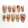 Nude press on nails with hand-painted ladybugs, green botanical vines, white daisies, honeybee, strawberry and dewdrop gel details for spring