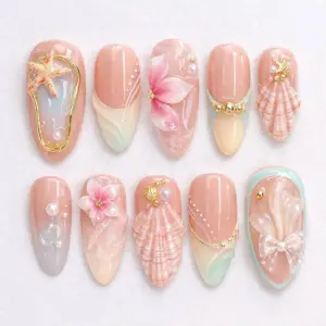 Ocean dream summer press on nails with 3D starfish shell floral and bow designs in peach pink tones