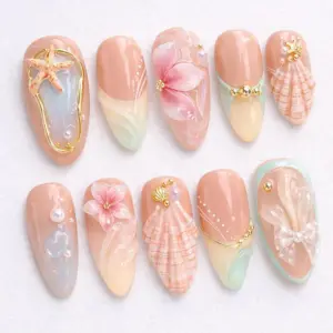 Ocean dream summer press on nails with 3D starfish shell floral and bow designs in peach pink tones