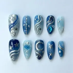 Ocean galaxy press on nails with blue gradient, silver moon, stars and chrome wave details