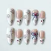 Elegant coquette bow fireworks pearl chain press on nails with blush white French tip and red blue star charms for 4th of July