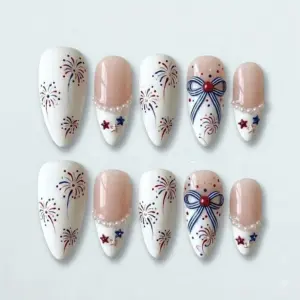 Elegant coquette bow fireworks pearl chain press on nails with blush white French tip and red blue star charms for 4th of July