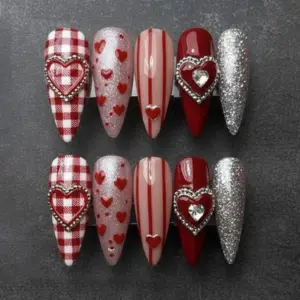 Red plaid and silver glitter Valentine's Day press on nails with 3D rhinestone heart charm, stripe and heart scatter designs