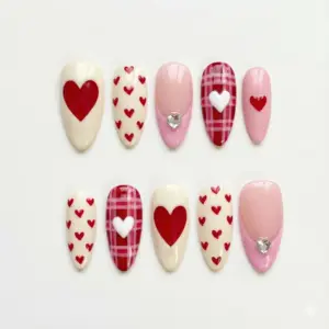 Cream and red Valentine's Day press on nails with bold heart, scattered heart print, plaid tartan with white heart and rhinestone gem accent in pink and cream