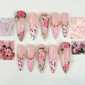 Pink rose garden stiletto press on nails with pearl embellishments, gold vine details, and white drip line art on blush base