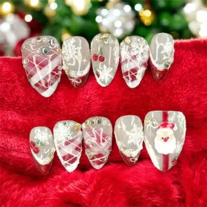 Sheer jelly Christmas press on nails with 3D Santa Claus charm, white snowflakes, red plaid overlay, cherry details and gold stud accents on translucent base