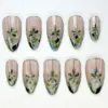 Stained glass floral press on nails in blush pink with silver lead lines, green and blue mosaic petals and chrome mirror tips