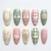 Swan cottagecore press on nails with floral wreath, painted geese, gingham pattern, rose bouquet, ribbon bow, wildflowers and mushrooms in cream pink sage green for spring