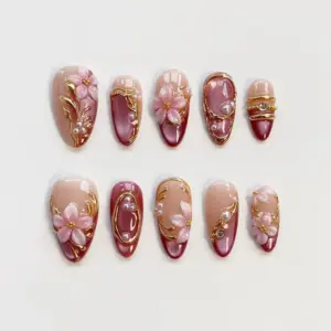 Cherry blossom 3D press on nails with gold vines, pearl accents and burgundy pink design for spring